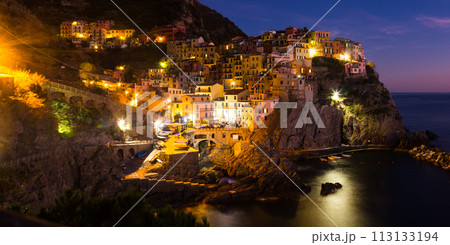 Colorful houses of Manarola, La Spezia in evening from sea view 113133194