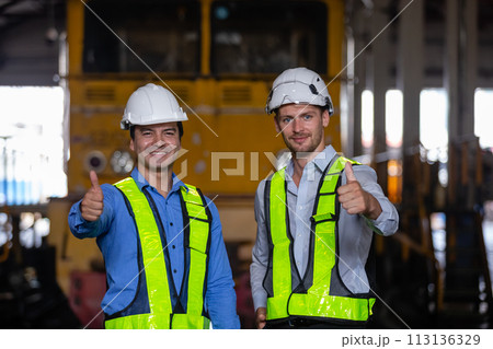Two various nationalities thumbs up railway technician engineer Inspect repair service. Two various nationalities thumbs up railway technician engineer Inspect repair service. 113136329