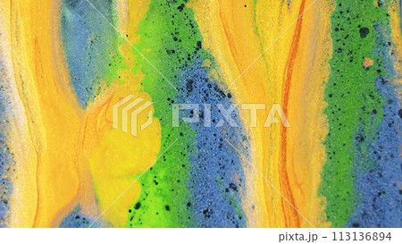 Abstract background. Glitter dye. Shiny liquid mix. Vivid yellow green blue black color ink shimmering particles grain texture paint drop wave spreading. Abstract background. Glitter dye. Shiny liquid mix. Vivid yellow green blue black color ink shimmering particles grain texture paint drop wave spreading. 113136894