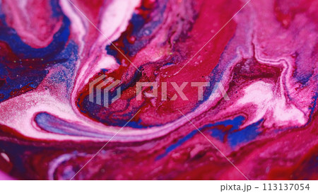 Ink background. Glitter paint. Color fluid mix. Captivating hypnotic macro abstract design red blue white pink pigment stream in fantasy magic liquid art. 113137054