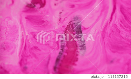 Pigment swirls. Paint flow. Defocused bright glamourous purple pink white color ink fluid blend stream spreading art abstract background. 113137216