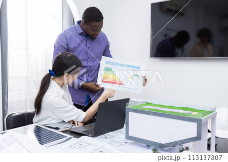 Young businessman and businesswoman various nationalities working analysis graph chart report Young businessman and businesswoman various nationalities working analysis graph chart report 113137807