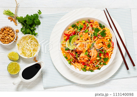 pad thai with shrimps, peanuts, eggs, bean sprouts pad thai with shrimps, peanuts, eggs, bean sprouts 113140098