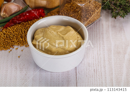 Dijon mustard sauce in the bowl 113143415