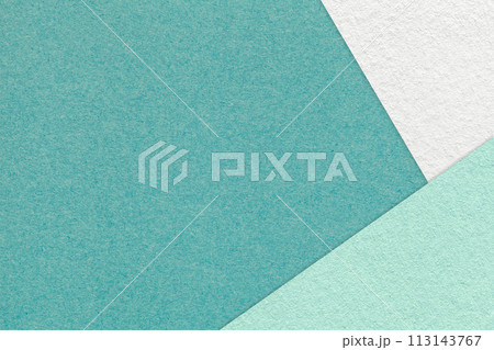 Texture of craft dark cyan color paper background with white and mint border. Vintage abstract green cardboard. 113143767