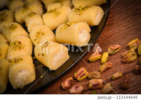 LEBANESE PASTRY RECIPE, ORIENTAL FOOD, HALAWET AL JEBEN, MOZARELLA, ASHTA AND FINE SEMOLINA 113144649