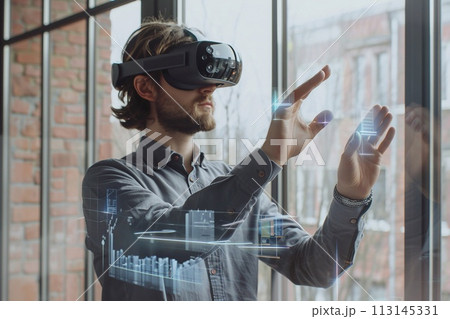 Young businessman working with modern virtual reality hologram technology, Young businessman perspective. 113145331