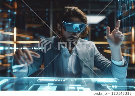 Young businessman working with modern virtual reality hologram technology, Young businessman perspective. 113145333