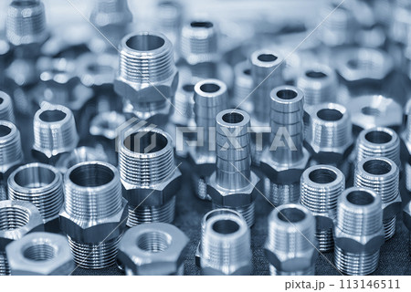 The pile of steel water pipe connector parts in the light blue scene. The pile of steel water pipe connector parts in the light blue scene. 113146511