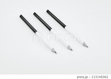 Black and white pencils with a dedicated copy space on a white background. Black and white pencils with a dedicated copy space on a white background. 113148362