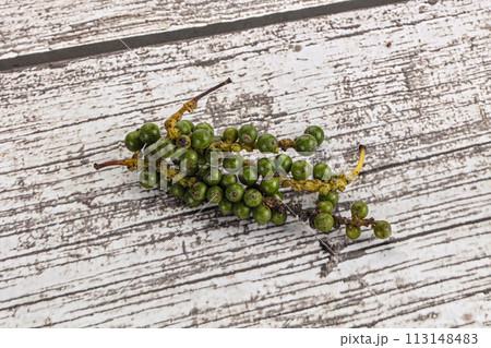 Green pepper corn heap isolated 113148483