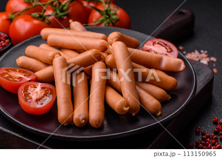Delicious fresh small vegetarian sausages with salt, spices and herbs 113150965