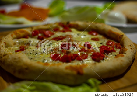 Fresh Homemade Italian Pizza Margherita with buffalo mozzarella and basil. Italian Cuisine. Fresh Homemade Italian Pizza Margherita with buffalo mozzarella and basil. Italian Cuisine. 113151024
