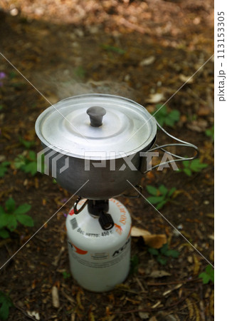 Making breakfast with a gas burner on the nature. 113153305