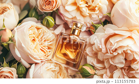 Perfume bottle with beautiful flowers. Floral background. Beauty concept. Flat lay, top view. 113155783