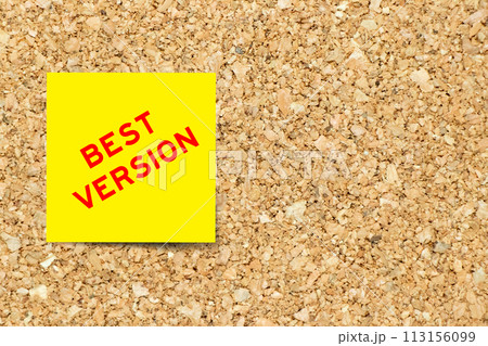 Yellow note paper with word best version on cork board background with copy space Yellow note paper with word best version on cork board background with copy space 113156099