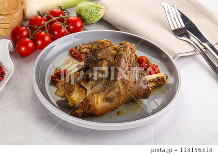 Baked Lamb shank with bone 113156318