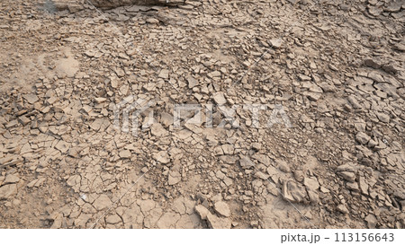 Dry barren and cracked soil surface texture 113156643