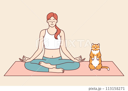 Woman does yoga with cat, meditating in lotus position from zen or asana practice Woman does yoga with cat, meditating in lotus position from zen or asana practice 113158271