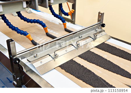 Machine with tubes for dough filling 113158954