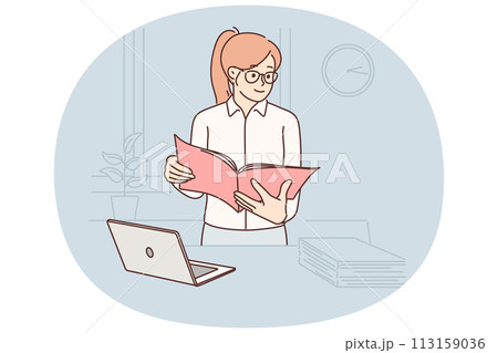 Business woman with documents stands in office near table with laptop checking reports employees Business woman with documents stands in office near table with laptop checking reports employees 113159036