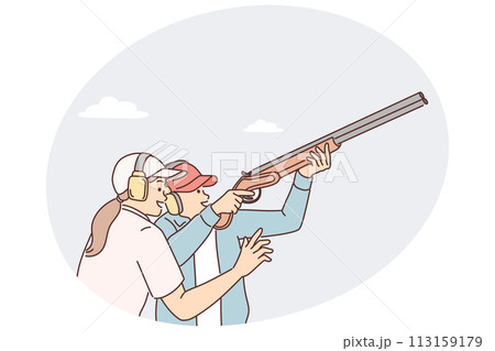 Man learns how to hold rifle and shoot cymbals with firearms under supervision woman trainer Man learns how to hold rifle and shoot cymbals with firearms under supervision woman trainer 113159179