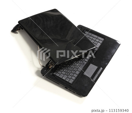 Old broken laptop isolated on white background 113159340