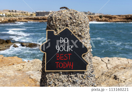 Do your best today symbol. Concept words Do your best today on beautiful black chalk blackboard. Beautiful stone blue sea sky background. Business motivational do your best today concept. Copy space. 113160221