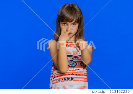 School child girl show pointing at her eyes and camera I am watching you gesture, spying on someone School child girl show pointing at her eyes and camera I am watching you gesture, spying on someone 113162229