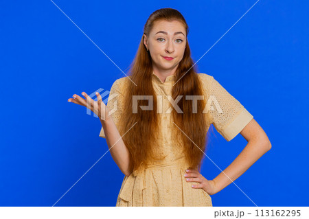 Woman raising hands in indignant expression ask why what reason of failure demonstrating disbelief 113162295