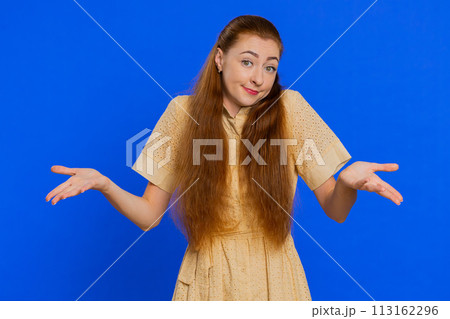 Woman raising hands in indignant expression ask why what reason of failure demonstrating disbelief Woman raising hands in indignant expression ask why what reason of failure demonstrating disbelief 113162296