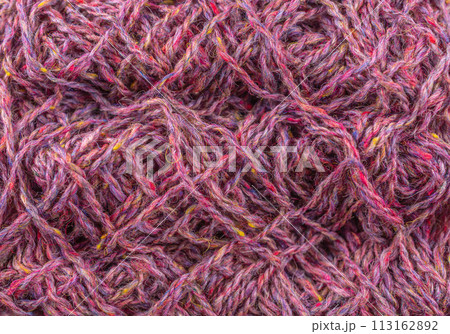 A close up of a bunch of yarn with a lot of different colors 113162892