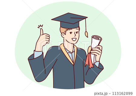 Graduate guy in academic gown and hat holds bundle with diploma and shows thumbs up Graduate guy in academic gown and hat holds bundle with diploma and shows thumbs up 113162899
