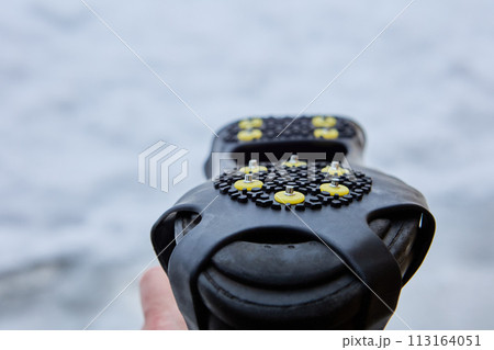 Traction on sidewalks of this over footwear rubber pad is provided by 10 small spikes, that digs into black ice and mixed snow. Traction on sidewalks of this over footwear rubber pad is provided by 10 small spikes, that digs into black ice and mixed snow. 113164051