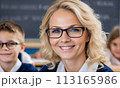 portrait female teacher, smile face, blonde hair, schoolchildren lesson, children class teacher, background group children, teamwork, group child smile, teacher with glasses, happy eyes school teacher 113165986