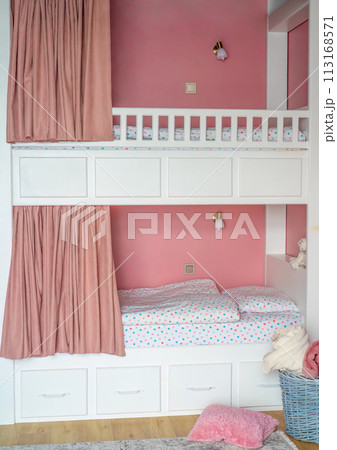 Pink curtains for bunk bed for girls in the bedroom without people 113168571