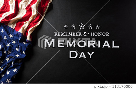 Happy memorial day concept made from american flag with text on black wooden background. Happy memorial day concept made from american flag with text on black wooden background. 113170000