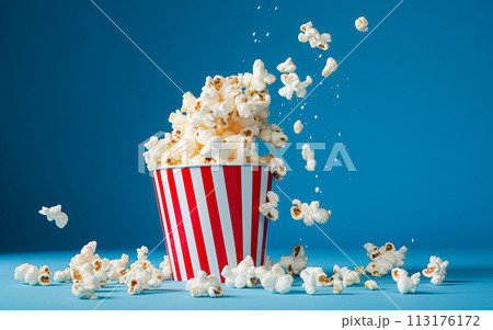 Popcorn in traditional red and white bucket on blue background. Generative Ai 113176172