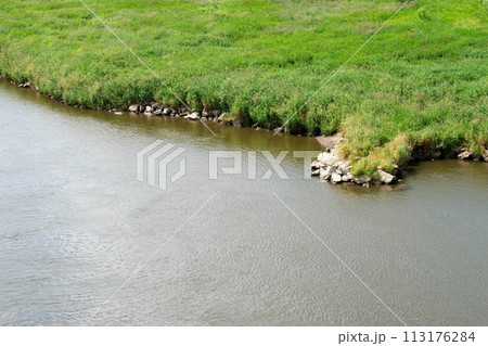 Village river stones is a beautiful countryside park nature view photo painting ,great for decoration ,book cover ,travel ,textile and fabric print ,gift card and different website and print purposes 113176284