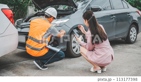 male insurance officer came to help inspect a customer's car that had an accident. Concept for vehicle crash, insurance claim. 113177398