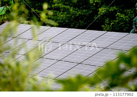 House roof with photovoltaic modules. House roof with photovoltaic modules. 113177902