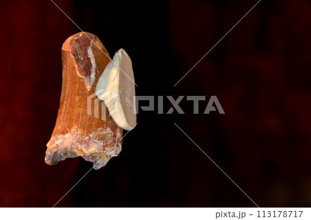 a large rock with a hole in it is floating in the air 113178717