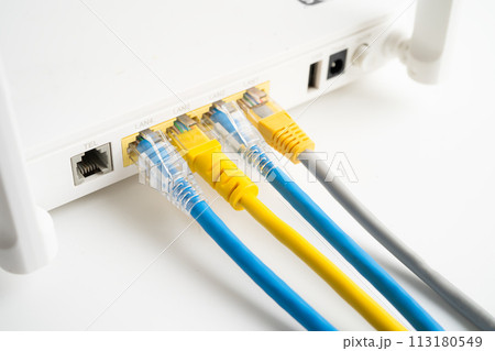 Ethernet cable with wireless router connect to internet service provider internet network. Ethernet cable with wireless router connect to internet service provider internet network. 113180549