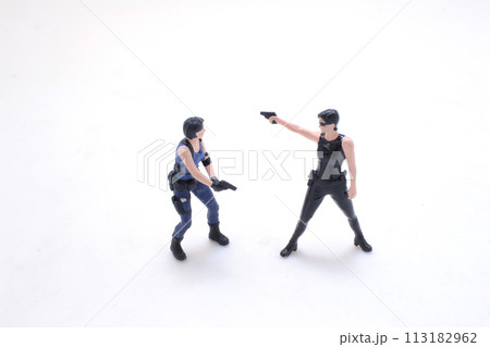 girl in an action movie film shootout pose girl in an action movie film shootout pose 113182962