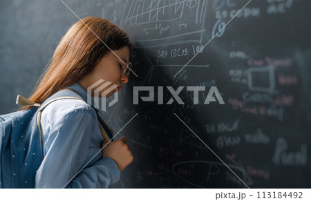 Unhappy teenager indoors Unhappy teenager indoors 113184492