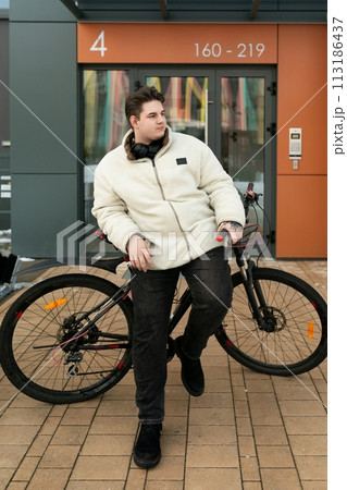 Lifestyle concept, young man rented a bicycle Lifestyle concept, young man rented a bicycle 113186437