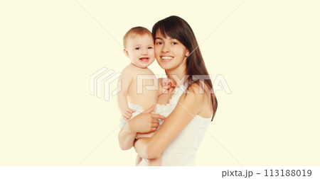 Happy cheerful smiling young mother holding baby on white background 113188019