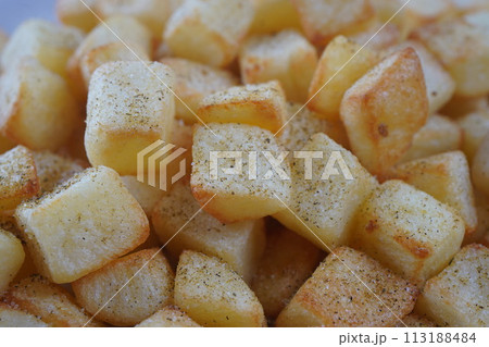 Spicy potato cut in cubes and fried, lebanese cuisine Spicy potato cut in cubes and fried, lebanese cuisine 113188484