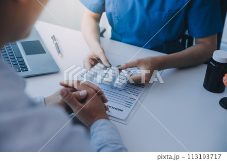 Doctor and patient are discussing consultation about symptom problem diagnosis of disease talk to the patient about medication and treatment method. Doctor and patient are discussing consultation about symptom problem diagnosis of disease talk to the patient about medication and treatment method. 113193717