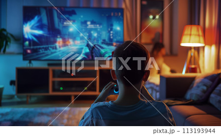 Boy Playing Video Game in Chair Boy Playing Video Game in Chair 113193944